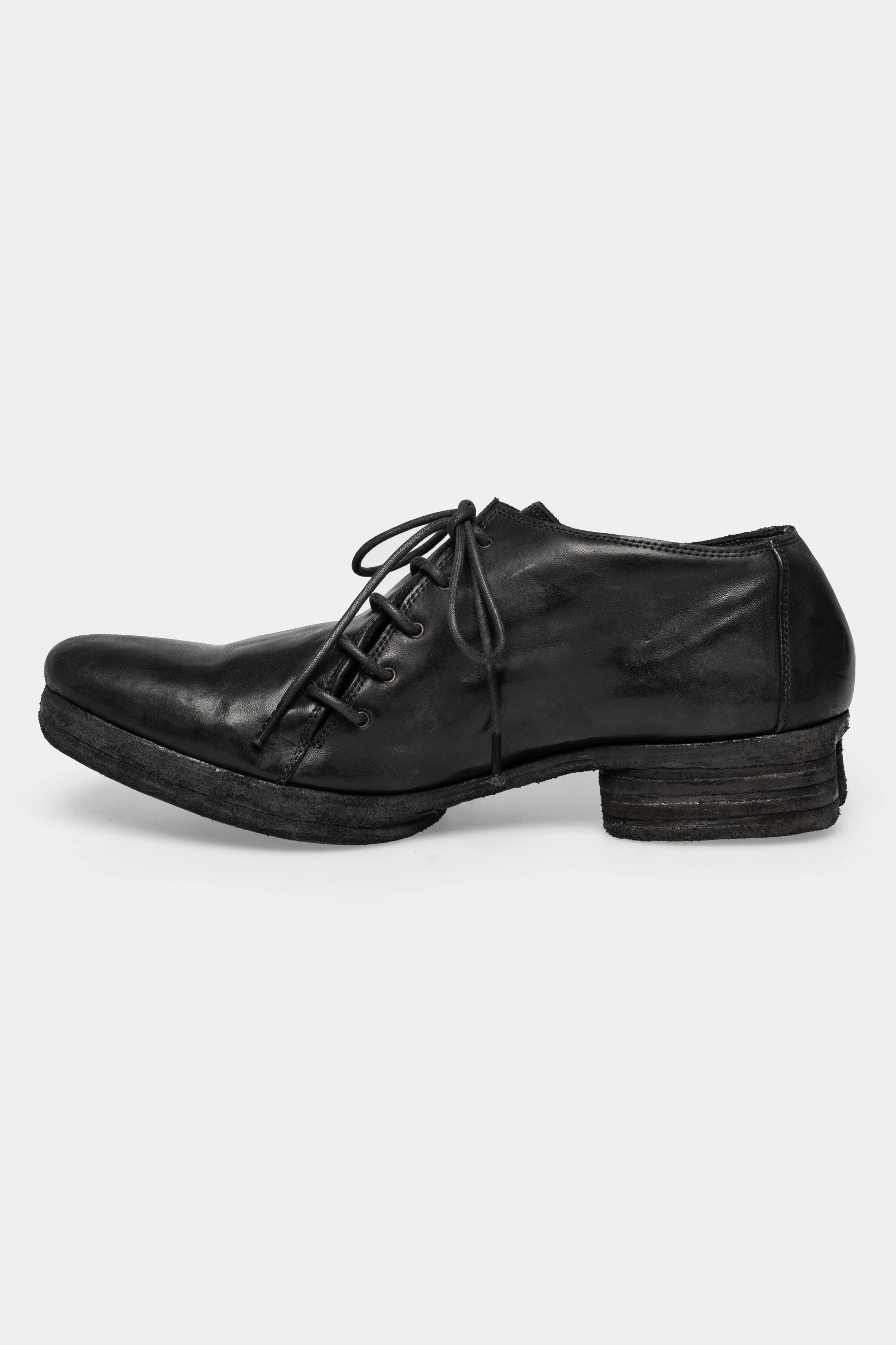 Asymmetrical laced leather horseshoe heel derbies