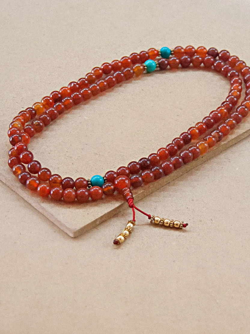 Carnelian Mala bead with Turquoise spacers