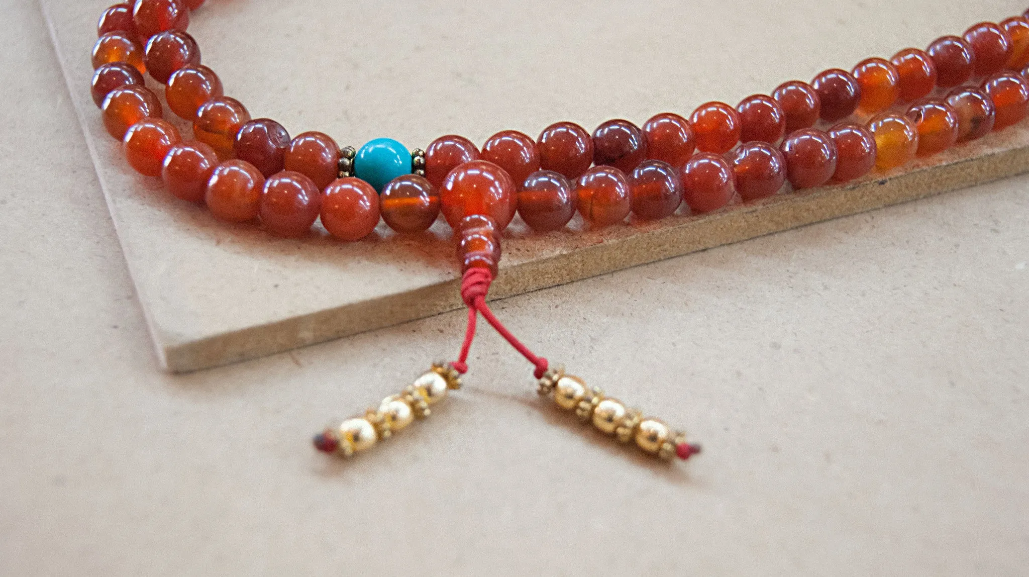 Carnelian Mala bead with Turquoise spacers